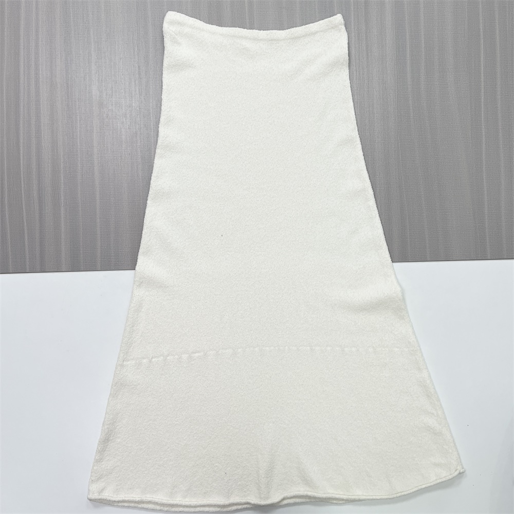 Юбка миди из текстурированного трикотажа на заказ: Завышенная талия, расклешенный крой, элегантный дизайн