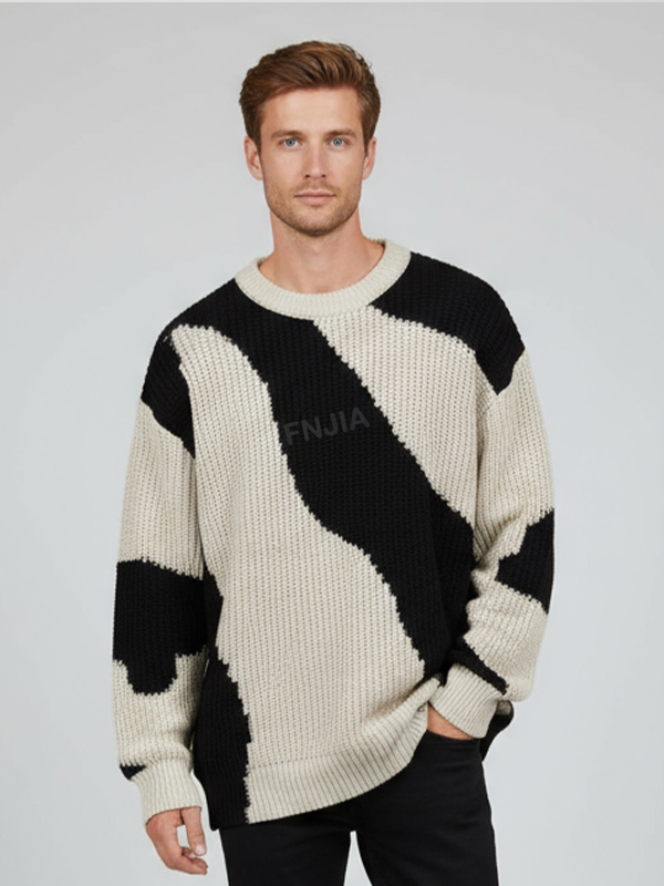 Мужской свитер объемной вязки с абстрактным волнистым рисунком черного и кремового цветов, выполненный в ярких цветовых блоках на заказ