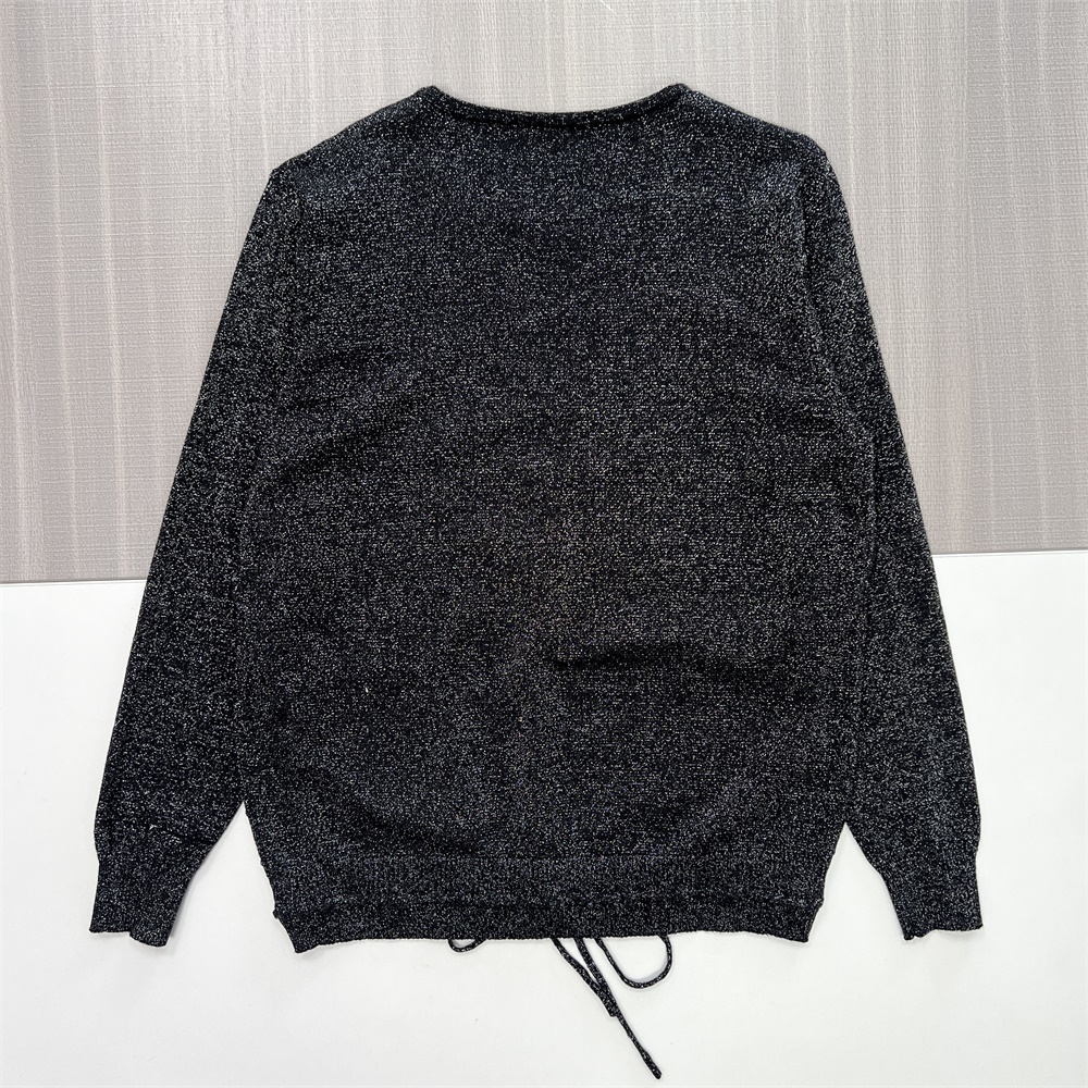 Женский вязаный свитер черного цвета с блестками (круглый вырез, накладные карманы и низ на завязках)